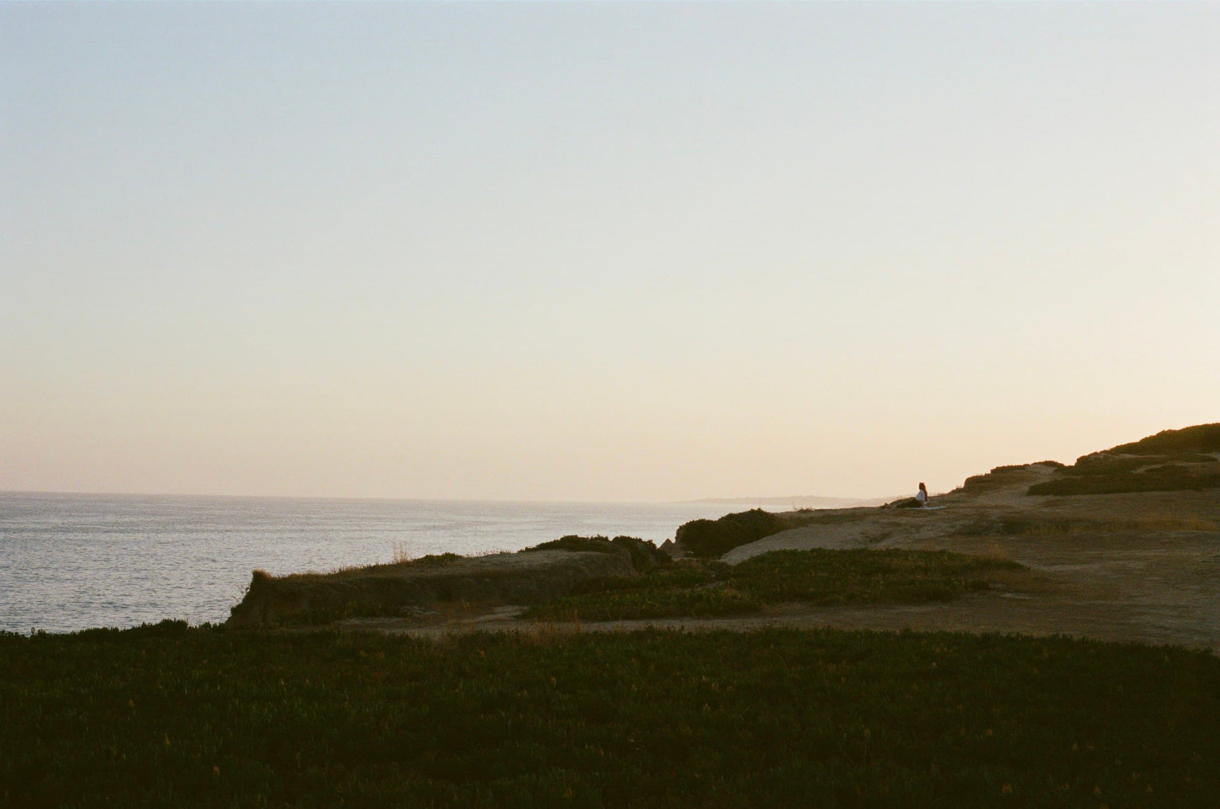 A quiet stretch of Portugal’s Algarve coast photographed on film at sunset